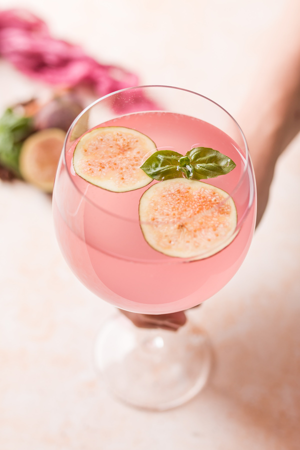 Pink cocktail with fig